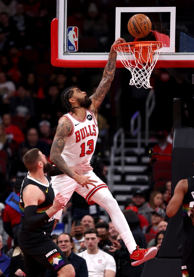 Chicago Bulls center Nick Richards (13) misses a dunk in the first half of a game against the Denver Nuggets at the United Center in Chicago on Feb. 7, 2026. (Chris Sweda/Chicago Tribune)
