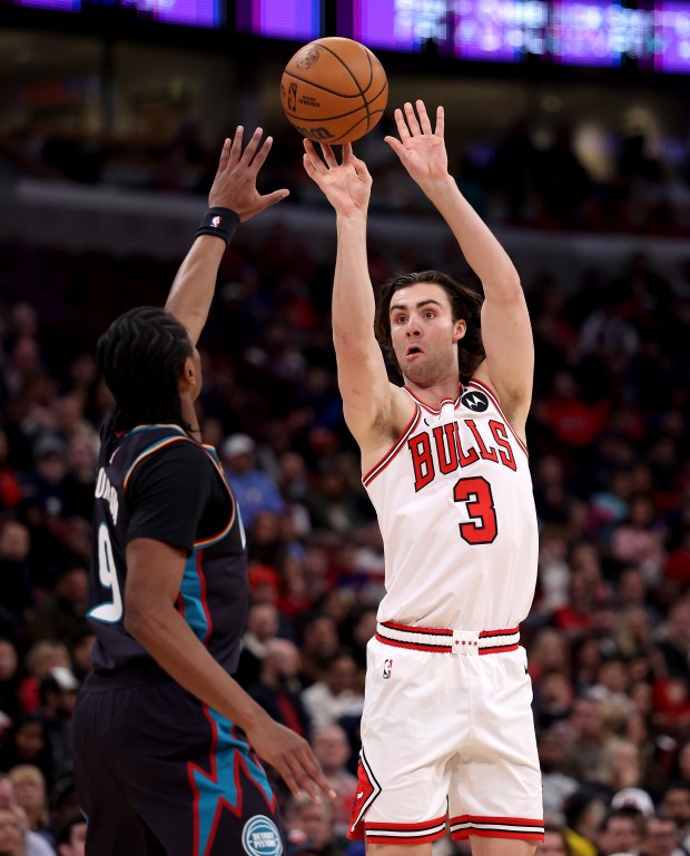 Chicago Bulls guard Josh Giddey (3) hits a 3-pointer in the first half of a game against the Detroit Pistons at the United Center in Chicago on Feb. 21, 2026. (Chris Sweda/Chicago Tribune)