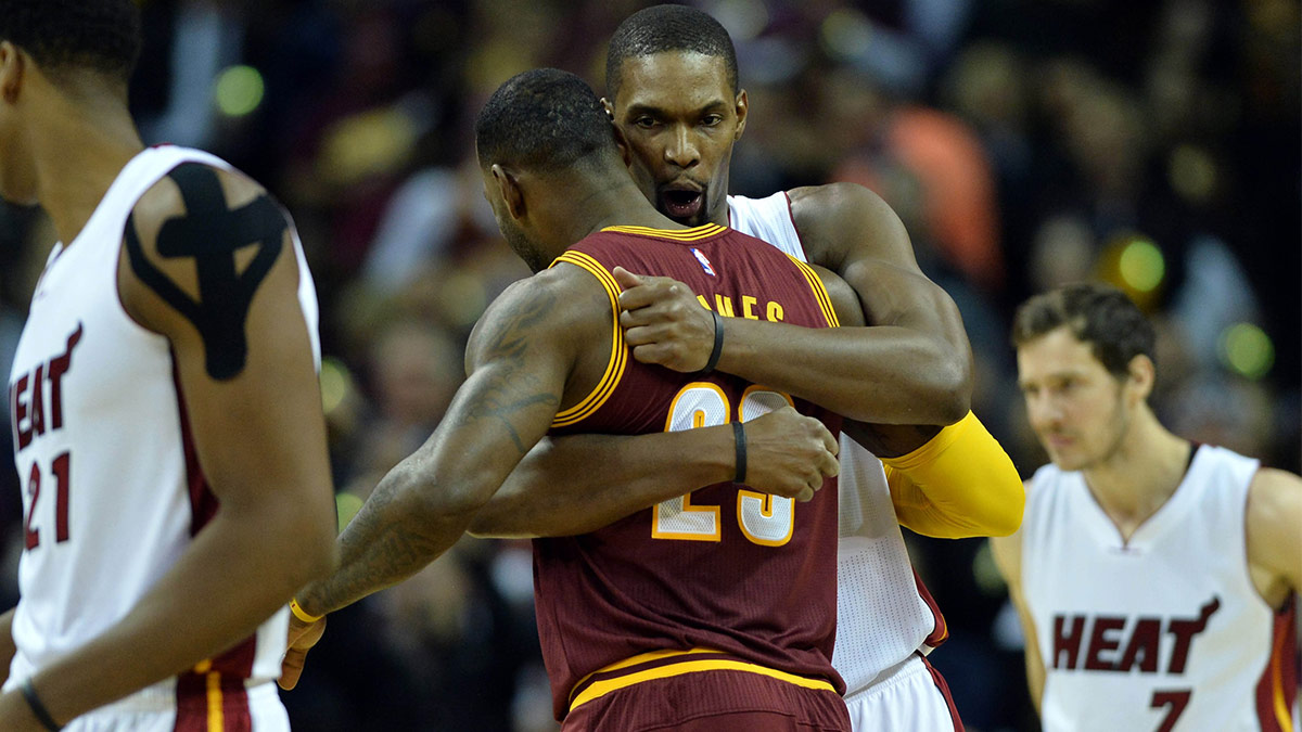 Cleveland Cavaliers forward LeBron James (23) greets Miami Heat forward Chris Bosh (1) before the game between the Cleveland Cavaliers and the Miami Heat at Quicken Loans Arena.