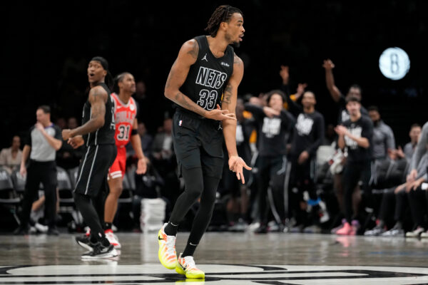 Brooklyn Nets center Nic Claxton (33) reacts after scoring a 3-point basket during the second half of an NBA basketball game against the Chicago Bulls, Monday, Feb. 9, 2026, in New York. (AP Photo/Yuki Iwamura)