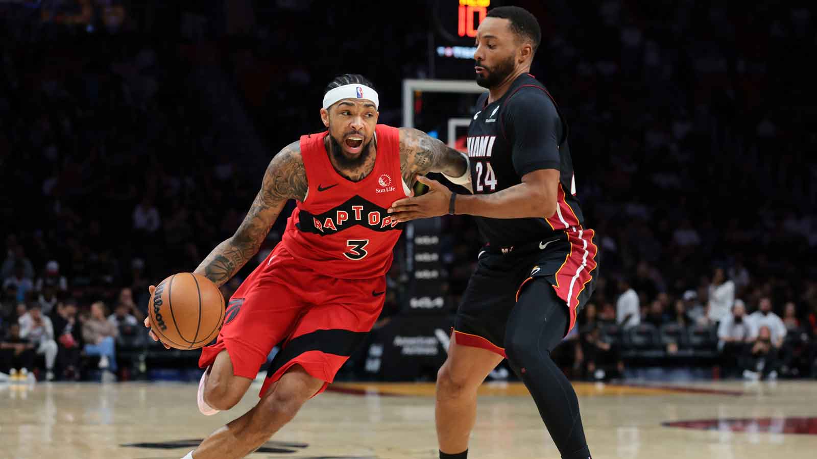 Toronto Raptors forward Brandon Ingram (3) drives to the basket against Miami Heat guard Norman Powell (24) during the second quarter at Kaseya Center.