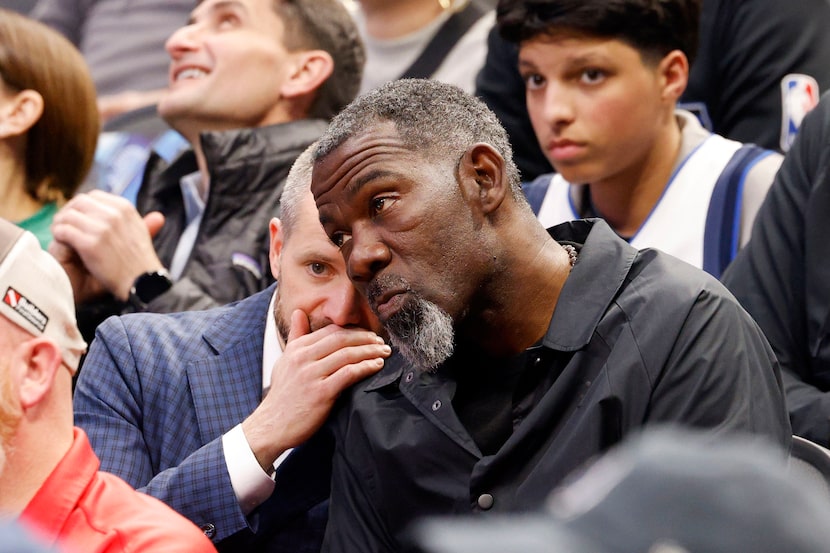 Dallas Mavericks co-interim general managers Matt Riccardi, left, and Michael Finley talk...
