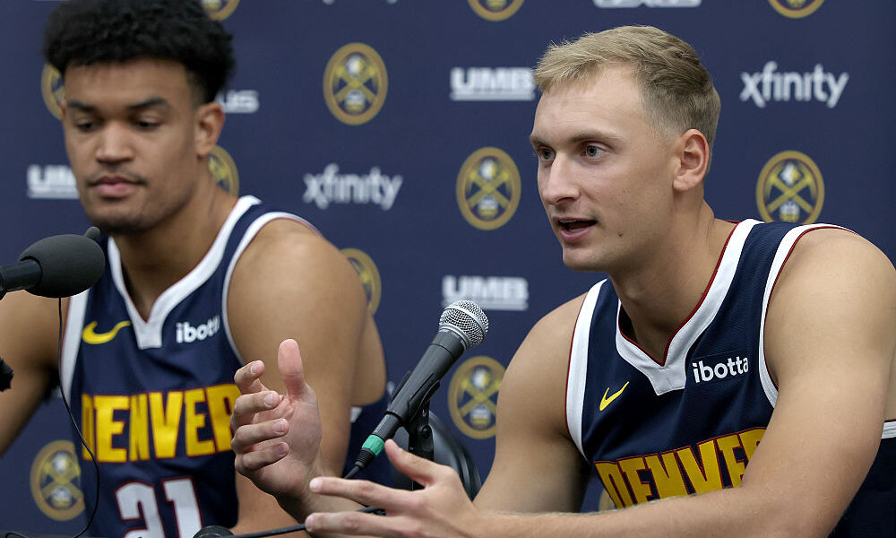 DENVER, COLORADO - SEPTEMBER 29: Hunter Tyson and Spencer Jones of the Denver Nuggets field questio...