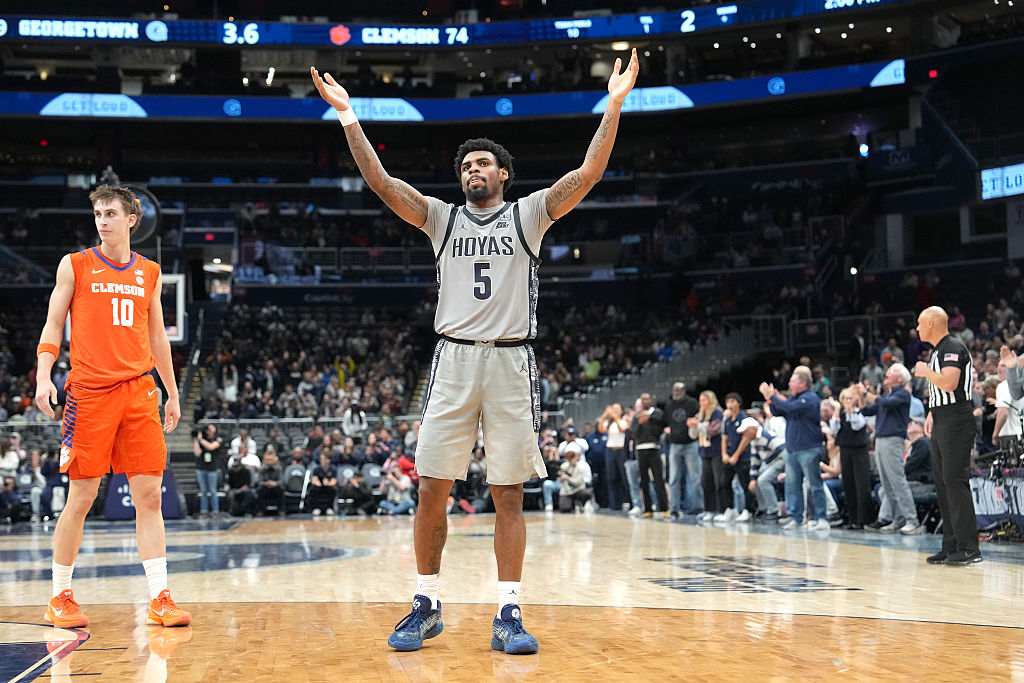 WASHINGTON, DC - NOVEMBER 15: KJ Lewis #5 of the Georgetown Hoyas celebrates a win after a college basketball game against the Clemson Tigers at Capital One Arena on November 15, 2025 in Washington, DC. (Photo by Mitchell Layton/Getty Images)