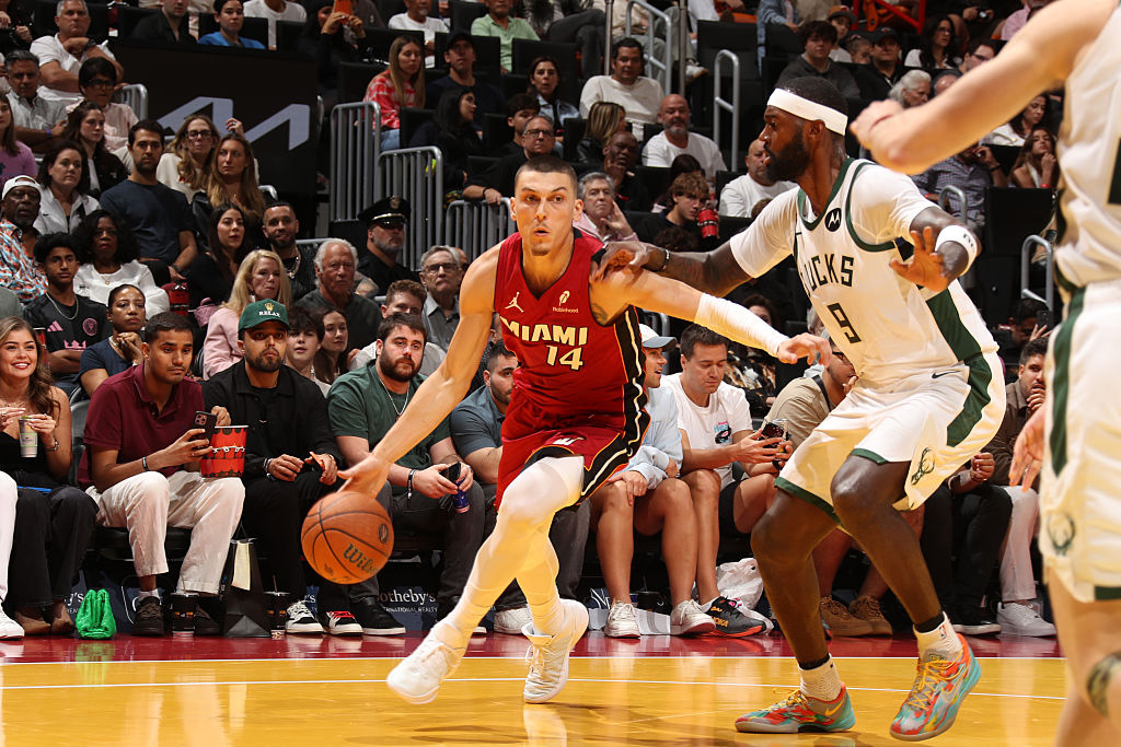 MIAMI, FL - NOVEMBER 26: Tyler Herro #14 of the Miami Heat drives to the basket during the game against the Milwaukee Bucks during the 2025-26 Emirates Cup on November 26, 2025 at Kaseya Center in Miami, Florida. NOTE TO USER: User expressly acknowledges and agrees that, by downloading and or using this Photograph, user is consenting to the terms and conditions of the Getty Images License Agreement. Mandatory Copyright Notice: Copyright 2025 NBAE (Photo by Issac Baldizon/NBAE via Getty Images)