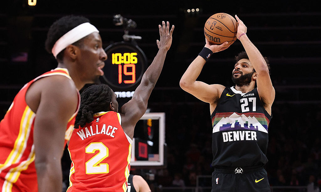 ATLANTA, GEORGIA - DECEMBER 05: Jamal Murray #27 of the Denver Nuggets shoots a three-point basket ...