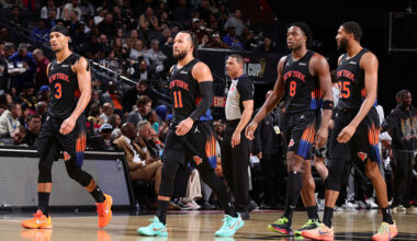 NEW YORK, NY - DECEMBER 16: Josh Hart #3, Jalen Brunson #11, OG Anunoby #8 and Mikal Bridges #25 of the New York Knicks look on during the game against the San Antonio Spurs during the NBA Emirates Cup Final on December 16, 2025 at T-Mobile Arena in Las Vegas, Nevada NOTE TO USER: User expressly acknowledges and agrees that, by downloading and or using this photograph, User is consenting to the terms and conditions of the Getty Images License Agreement. Mandatory Copyright Notice: Copyright 2025 NBAE (Photo by Nathaniel S. Butler/NBAE via Getty Images)