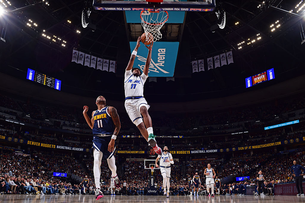 DENVER, CO - DECEMBER 18: Jase Richardson #11 of the Orlando Magic dunks the ball during the game against the Denver Nuggets on December 18, 2025 at Ball Arena in Denver, Colorado. NOTE TO USER: User expressly acknowledges and agrees that, by downloading and/or using this Photograph, user is consenting to the terms and conditions of the Getty Images License Agreement. Mandatory Copyright Notice: Copyright 2025 NBAE (Photo by Garrett Ellwood/NBAE via Getty Images)