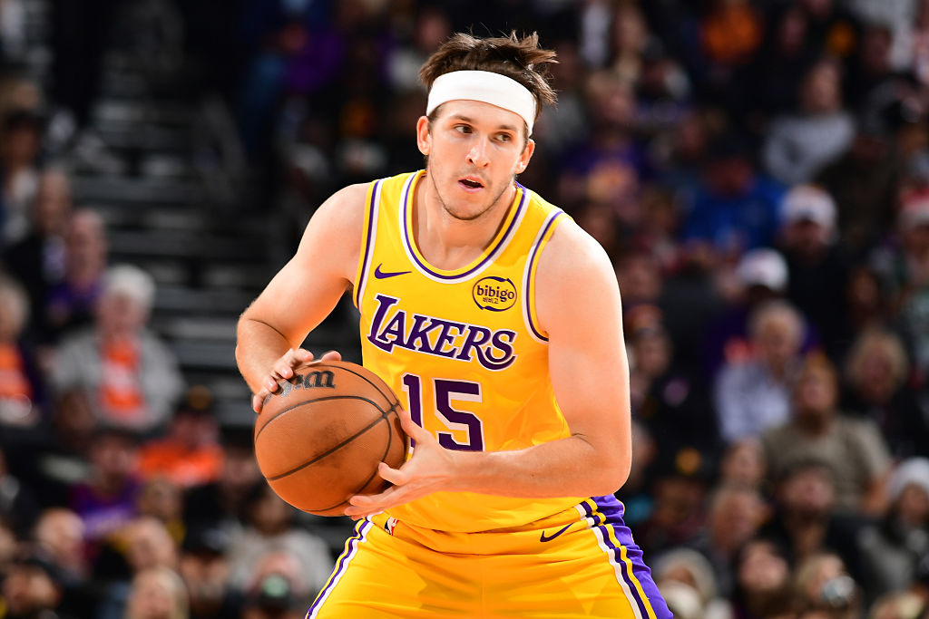 PHOENIX, AZ - DECEMBER 23: Austin Reaves #15 of the Los Angeles Lakers handles the ball during the game against the Phoenix Suns on December 23, 2025 at PHX Arena in Phoenix, Arizona. NOTE TO USER: User expressly acknowledges and agrees that, by downloading and or using this photograph, user is consenting to the terms and conditions of the Getty Images License Agreement. Mandatory Copyright Notice: Copyright 2025 NBAE (Photo by Kate Frese/NBAE via Getty Images)