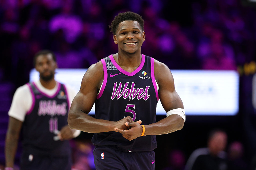 MINNEAPOLIS, MINNESOTA - DECEMBER 21: Anthony Edwards #5 of the Minnesota Timberwolves smiles in the third quarter of the game against the Milwaukee Bucks at Target Center on December 21, 2025 in Minneapolis, Minnesota. The Timberwolves defeated the Bucks 103-100.