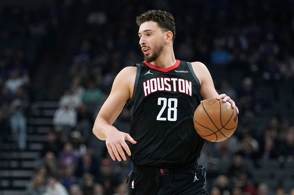 SACRAMENTO, CALIFORNIA - JANUARY 11: Alperen Sengun #28 of the Houston Rockets dribbles the ball against the Sacramento Kings in the first half of an NBA basketball game at Golden 1 Center on January 11, 2026 in Sacramento, California. NOTE TO USER: User expressly acknowledges and agrees that, by downloading and or using this photograph, User is consenting to the terms and conditions of the Getty Images License Agreement. (Photo by Thearon W. Henderson/Getty Images)