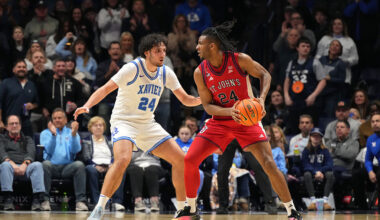 CINCINNATI, OHIO - JANUARY 24: Zuby Ejiofor #24 of the St. John's Red Storm controls the ball against Jovan Milicevic #24 of the Xavier Musketeers during an NCAA basketball game at Cintas Center on January 24, 2026 in Cincinnati, Ohio. (Photo by Jeff Dean/Getty Images)