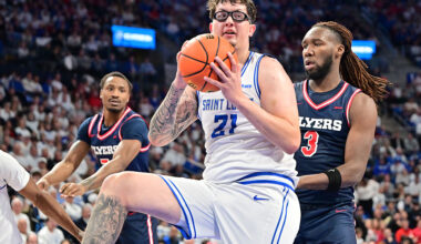 ST. LOUIS, MO - JANUARY 30: Saint Louis center Robbie Avila (21) pulls down a rebound as Dayton Flyers forward Jaiun Simon (3) defends during an Atlantic Ten Conference basketball game between the Dayton Flyers and the Saint Louis Billikens, on Jan. 30, 2026, at Chaifetz Arena in St. Louis, MO. (Photo by Keith Gillett/Icon Sportswire via Getty Images)
