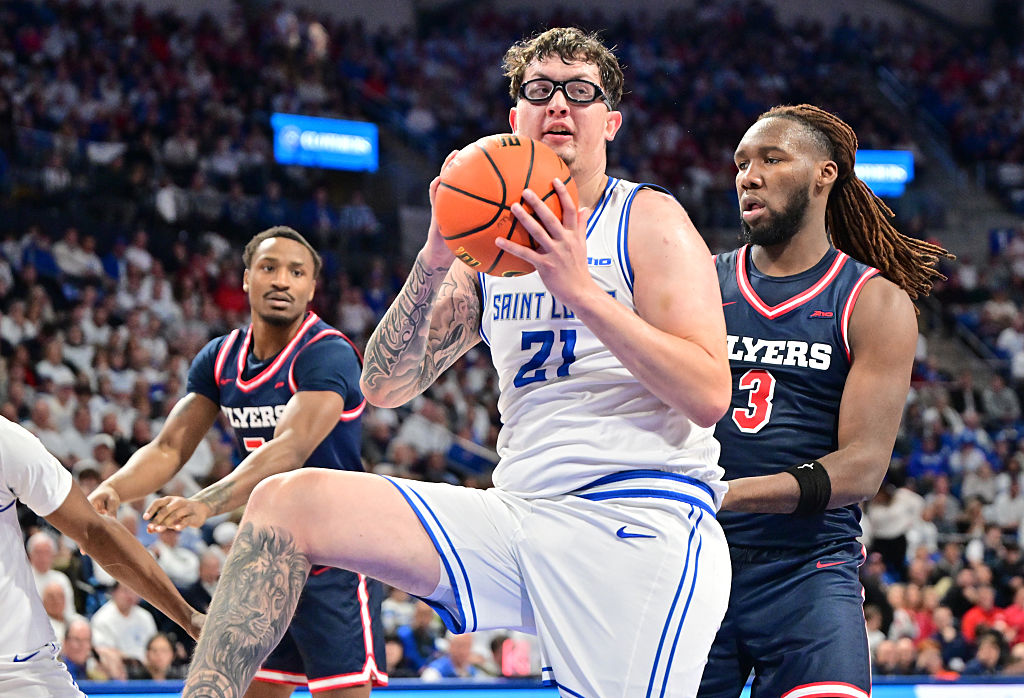 ST. LOUIS, MO - JANUARY 30: Saint Louis center Robbie Avila (21) pulls down a rebound as Dayton Flyers forward Jaiun Simon (3) defends during an Atlantic Ten Conference basketball game between the Dayton Flyers and the Saint Louis Billikens, on Jan. 30, 2026, at Chaifetz Arena in St. Louis, MO. (Photo by Keith Gillett/Icon Sportswire via Getty Images)