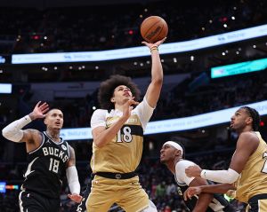 WASHINGTON, DC -  JANUARY 29: Kyshawn George #18 of the Washington Wizards drives to the basket during the game against the Milwaukee Bucks on January 29, 2026 at Capital One Arena in Washington, DC. NOTE TO USER: User expressly acknowledges and agrees that, by downloading and or using this Photograph, user is consenting to the terms and conditions of the Getty Images License Agreement. Mandatory Copyright Notice: Copyright 2026 NBAE (Photo by Sabina Shysh/NBAE via Getty Images)