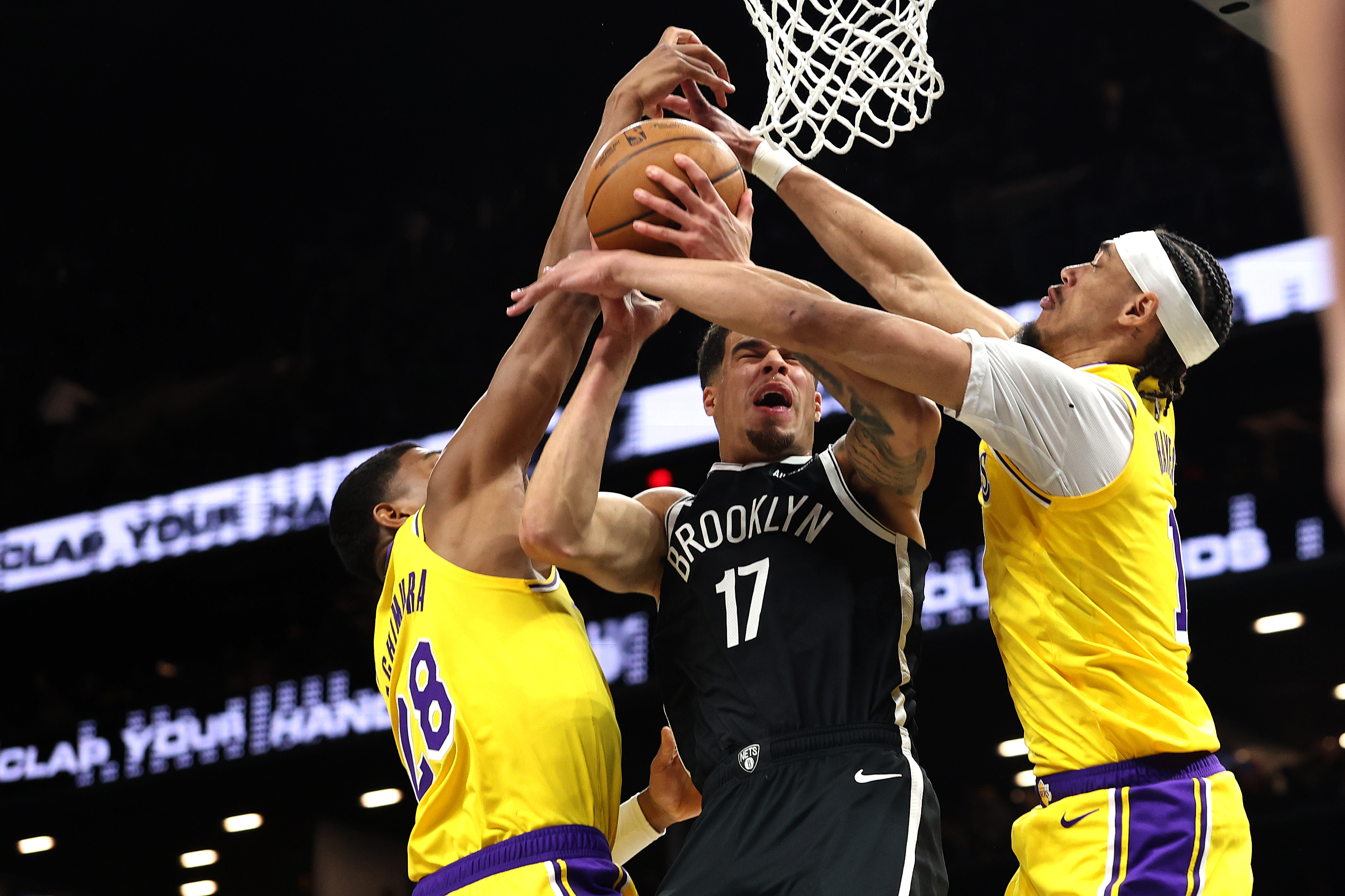 Brooklyn Nets forward Michael Porter Jr. grabs a rebound between...