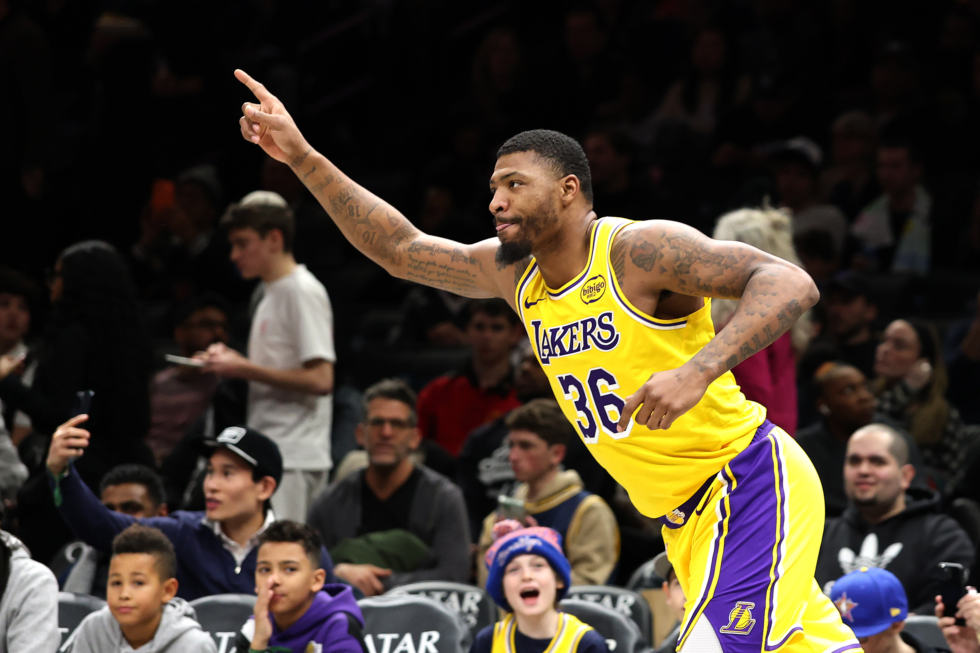 Lakers guard Marcus Smart gestures after a 3-point shot during...