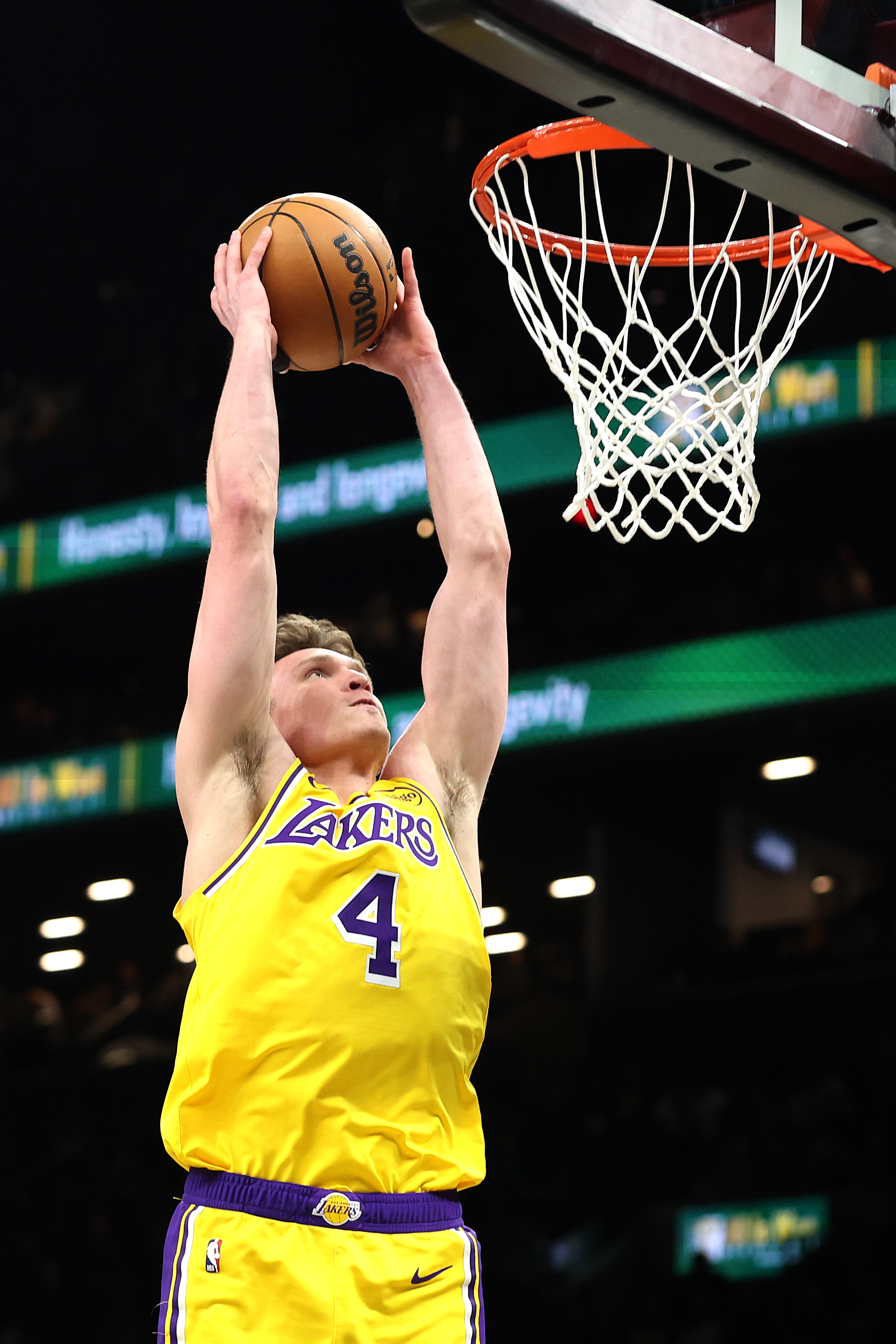 Lakers guard Dalton Knecht dunks during the second half of...