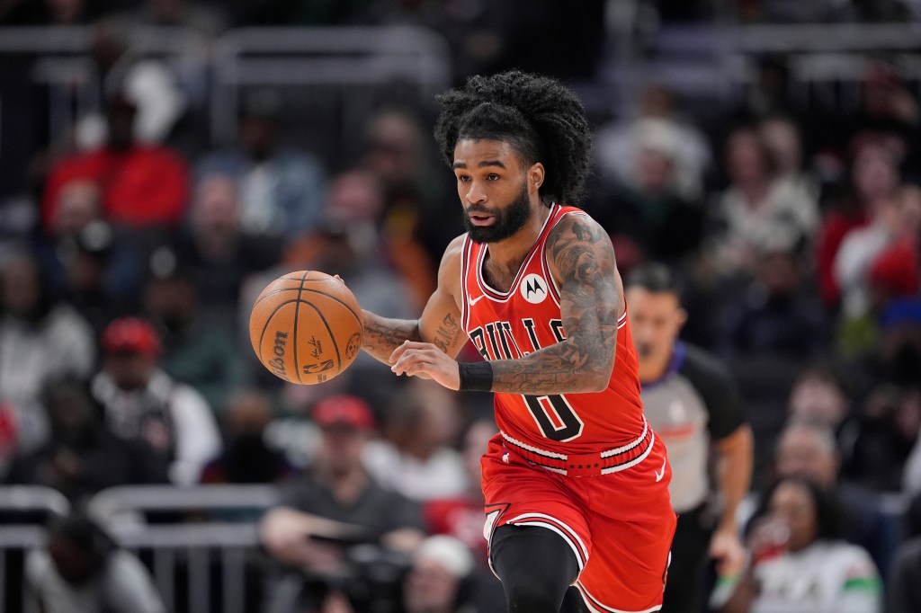 Coby White #0 of the Chicago Bulls dribbles the ball against the Milwaukee Bucks during the first quarter at Fiserv Forum on February 03, 2026 in Milwaukee, Wisconsin. 