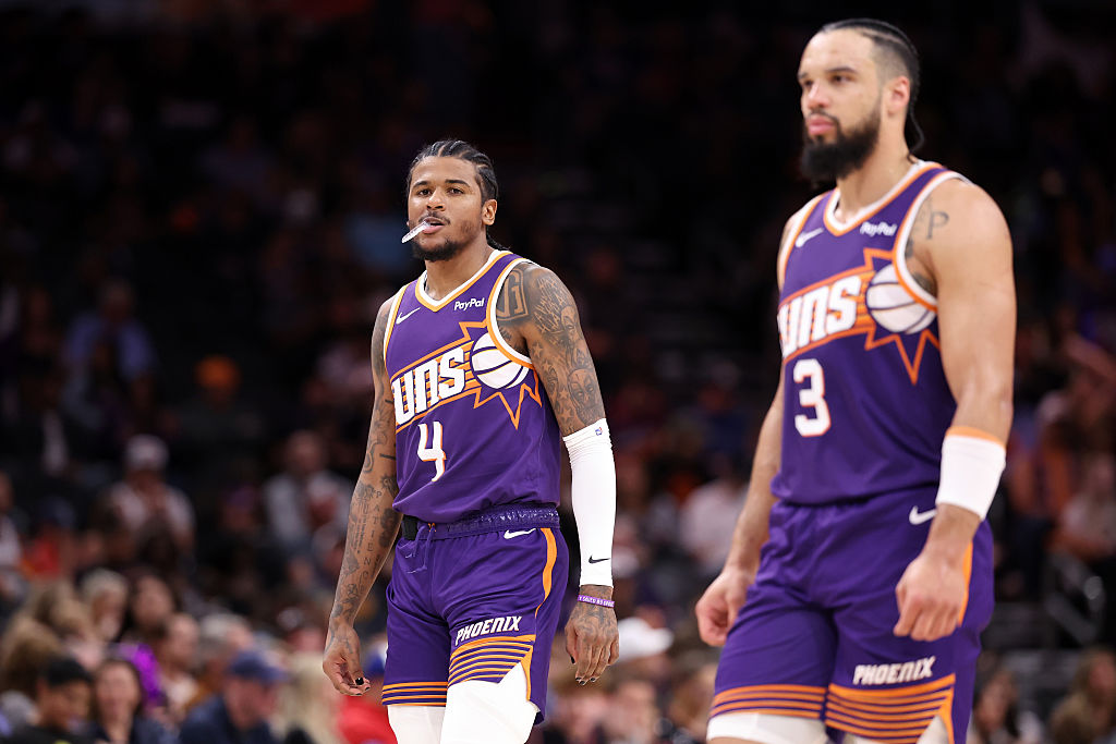 PHOENIX, ARIZONA - FEBRUARY 07: Jalen Green #4 and Dillon Brooks #3 of the Phoenix Suns walk during a timeout in the second half against the Philadelphia 76ers at Mortgage Matchup Center on February 07, 2026 in Phoenix, Arizona. NOTE TO USER: User expressly acknowledges and agrees that, by downloading and or using this photograph, User is consenting to the terms and conditions of the Getty Images License Agreement. (Photo by Chris Coduto/Getty Images)