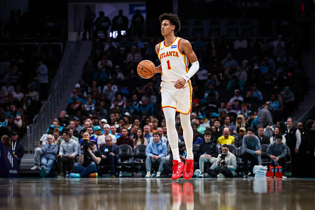 CHARLOTTE, NORTH CAROLINA - FEBRUARY 11: Jalen Johnson #1 of the Atlanta Hawks brings the ball down the court during the first half of the basketball game against the Charlotte Hornets at Spectrum Center on February 11, 2026 in Charlotte, North Carolina. NOTE TO USER: User expressly acknowledges and agrees that, by downloading and or using this photograph, User is consenting to the terms and conditions of the Getty Images License Agreement. (Photo by David Jensen/Getty Images)