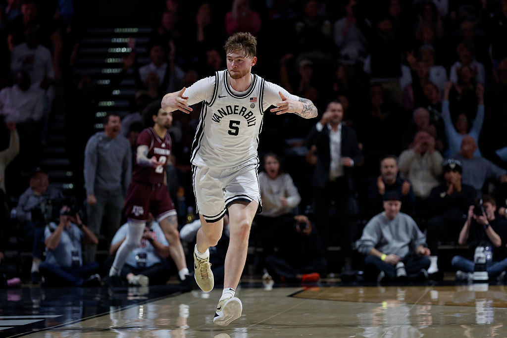 NASHVILLE, TN - FEBRUARY 14: Vanderbilt Commodores forward Tyler Nickel (5) holds up three fingers and looks over to the crowd after hitting a 3-pointer during a game between the Vanderbilt Commodores and Texas A&M Aggies, February 14, 2026, at Memorial Gymnasium in Nashville, Tennessee.
