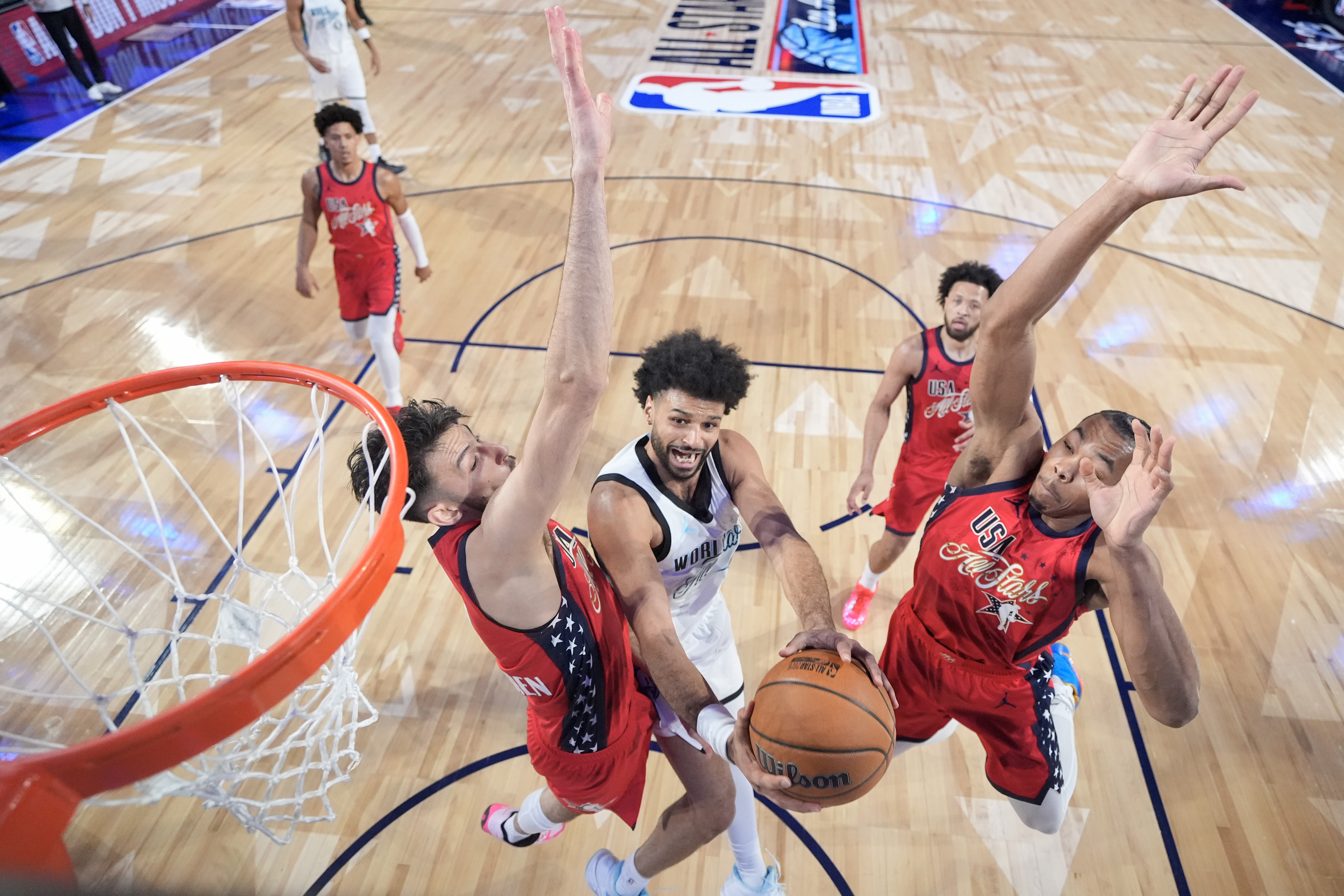 Denver Nuggets guard Jamal Murray of Team World shoots as...