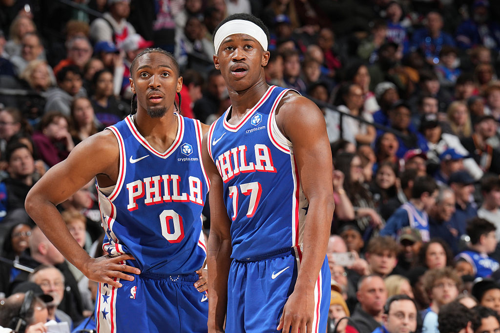PHILADELPHIA, PA - FEBRUARY 19: Tyrese Maxey #0 and VJ Edgecombe #77 of the Philadelphia 76ers look on during the game against the Atlanta Hawks on February 19, 2026 at the Wells Fargo Center in Philadelphia, Pennsylvania NOTE TO USER: User expressly acknowledges and agrees that, by downloading and/or using this Photograph, user is consenting to the terms and conditions of the Getty Images License Agreement. Mandatory Copyright Notice: Copyright 2026 NBAE (Photo by Jesse D. Garrabrant/NBAE via Getty Images)