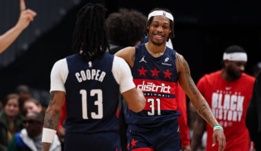 WASHINGTON, DC - FEBRUARY 20: Alondes Williams #31 and Sharife Cooper #13 of the Washington Wizards celebrate after a play against the Indiana Pacers during the second half at Capital One Arena on February 20, 2026 in Washington, DC.