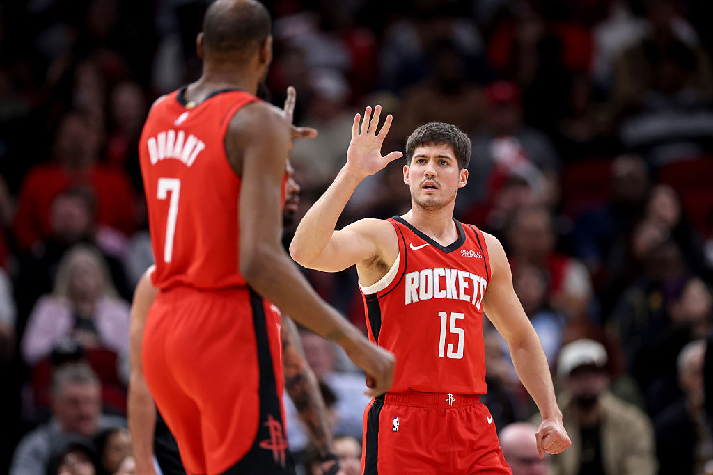 HOUSTON, TEXAS - FEBRUARY 23: Kevin Durant #7 of the Houston Rockets acknowledges Reed Sheppard #15 in the first half against the Utah Jazz at Toyota Center on February 23, 2026 in Houston, Texas.