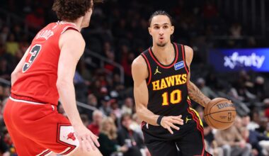 ATLANTA, GEORGIA - DECEMBER 21: Zaccharie Risacher #10 of the Atlanta Hawks drives against Josh Giddey #3 of the Chicago Bulls during the first quarter at State Farm Arena on December 21, 2025 in Atlanta, Georgia