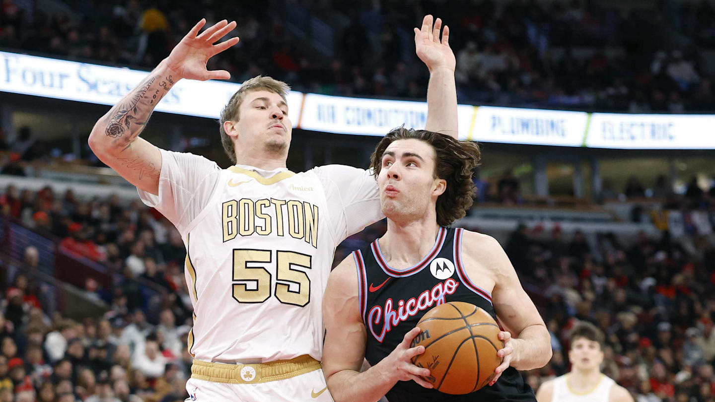 Jan 24, 2026; Chicago, Illinois, USA; Chicago Bulls guard Josh Giddey (3)drives to the basket against Boston Celtics guard Baylor Scheierman (55)during the first half at United Center. Mandatory Credit: Kamil Krzaczynski-Imagn Images