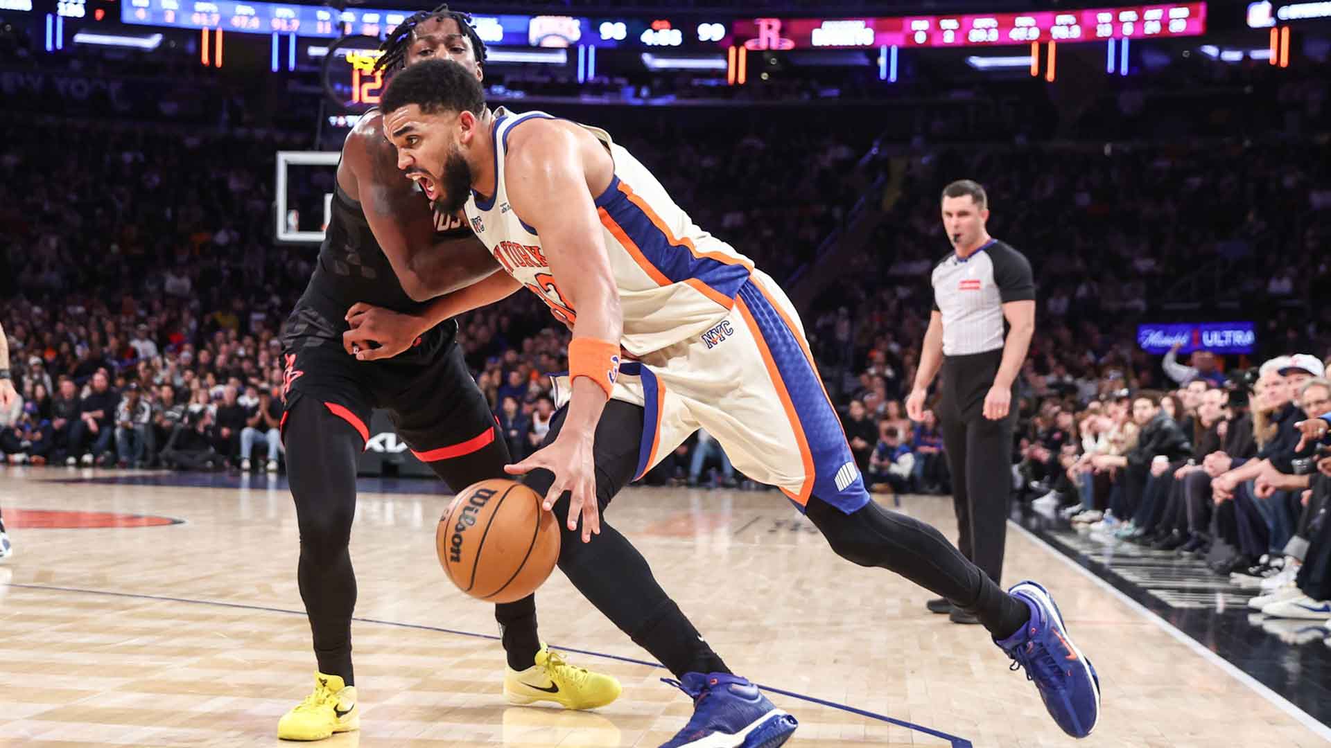 New York Knicks center Karl-Anthony Towns (32) looks to drive past Houston Rockets forward Dorian Finney-Smith (2) in the fourth quarter at Madison Square Garden. 