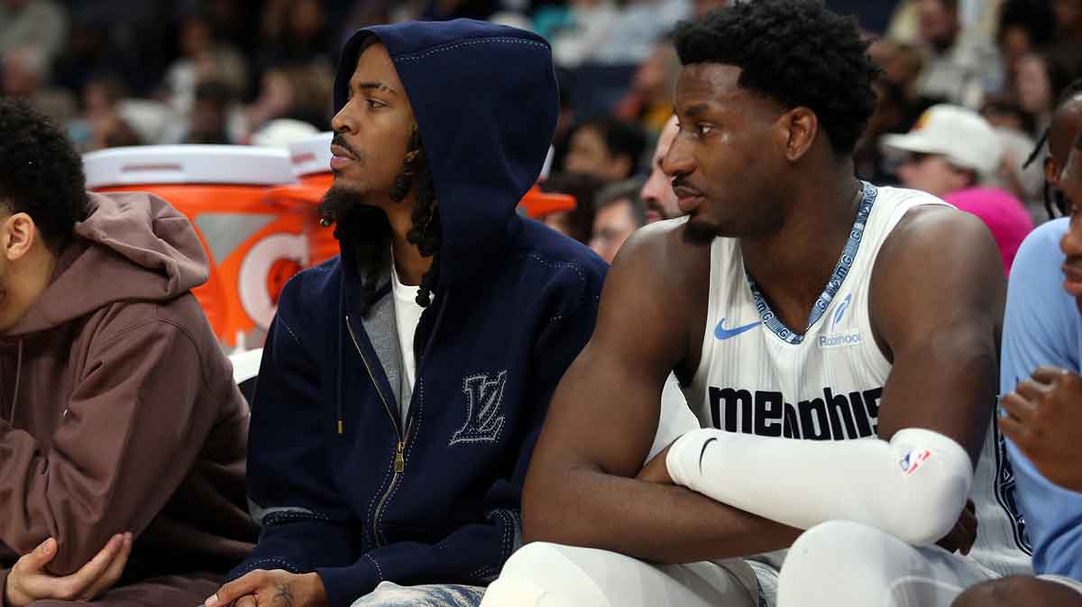 Memphis Grizzlies guard Ja Morant (left) and forward/center Jaren Jackson Jr. (right) looks on during the second quarter against the Brooklyn Nets at FedExForum.