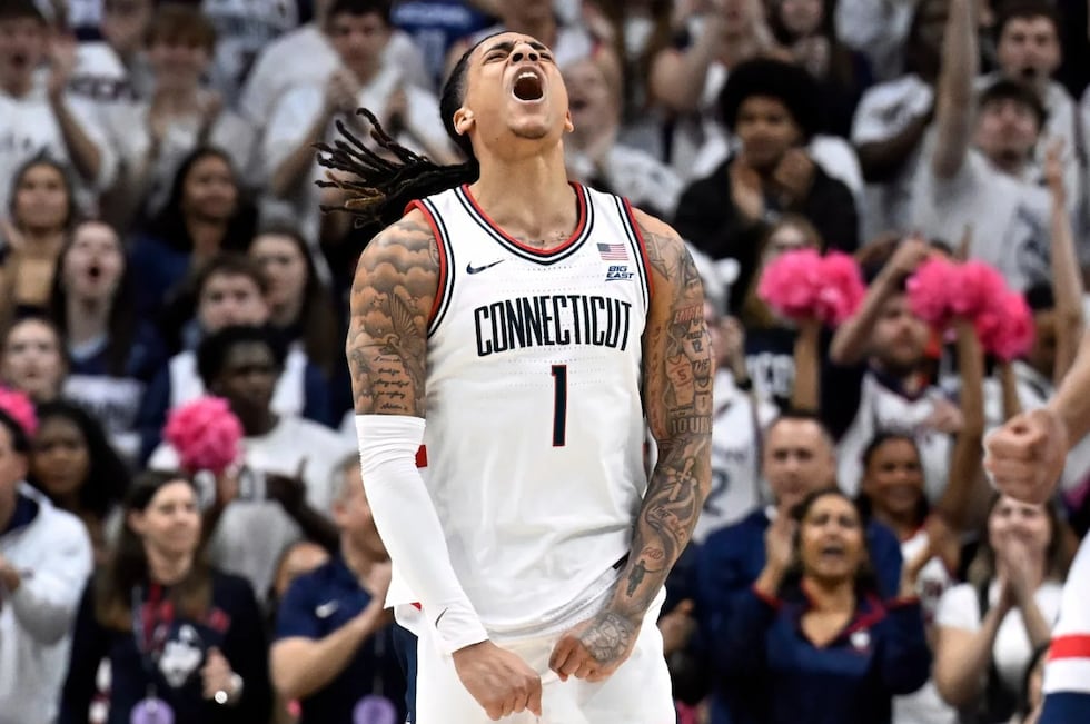 UConn guard Solo Ball (1) reacts in the first half of an NCAA college basketball game against...