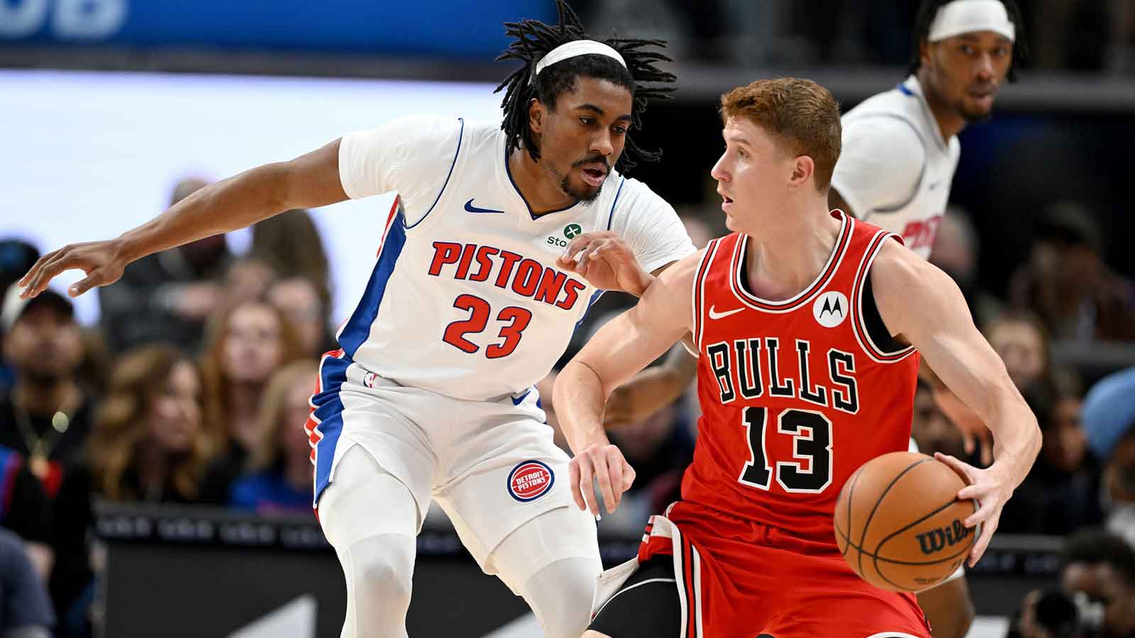 Detroit Pistons guard Jaden Ivey (23) guards Chicago Bulls guard Kevin Huerter (13) in the first quarter at Little Caesars Arena