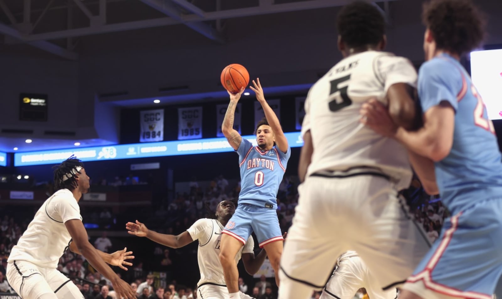 Dayton's Javon Bennett shoots against Virginia Commonwealth on Friday, Feb. 6, 2026, at the Siegel Center in Richmond, Va. David Jablonski/Staff