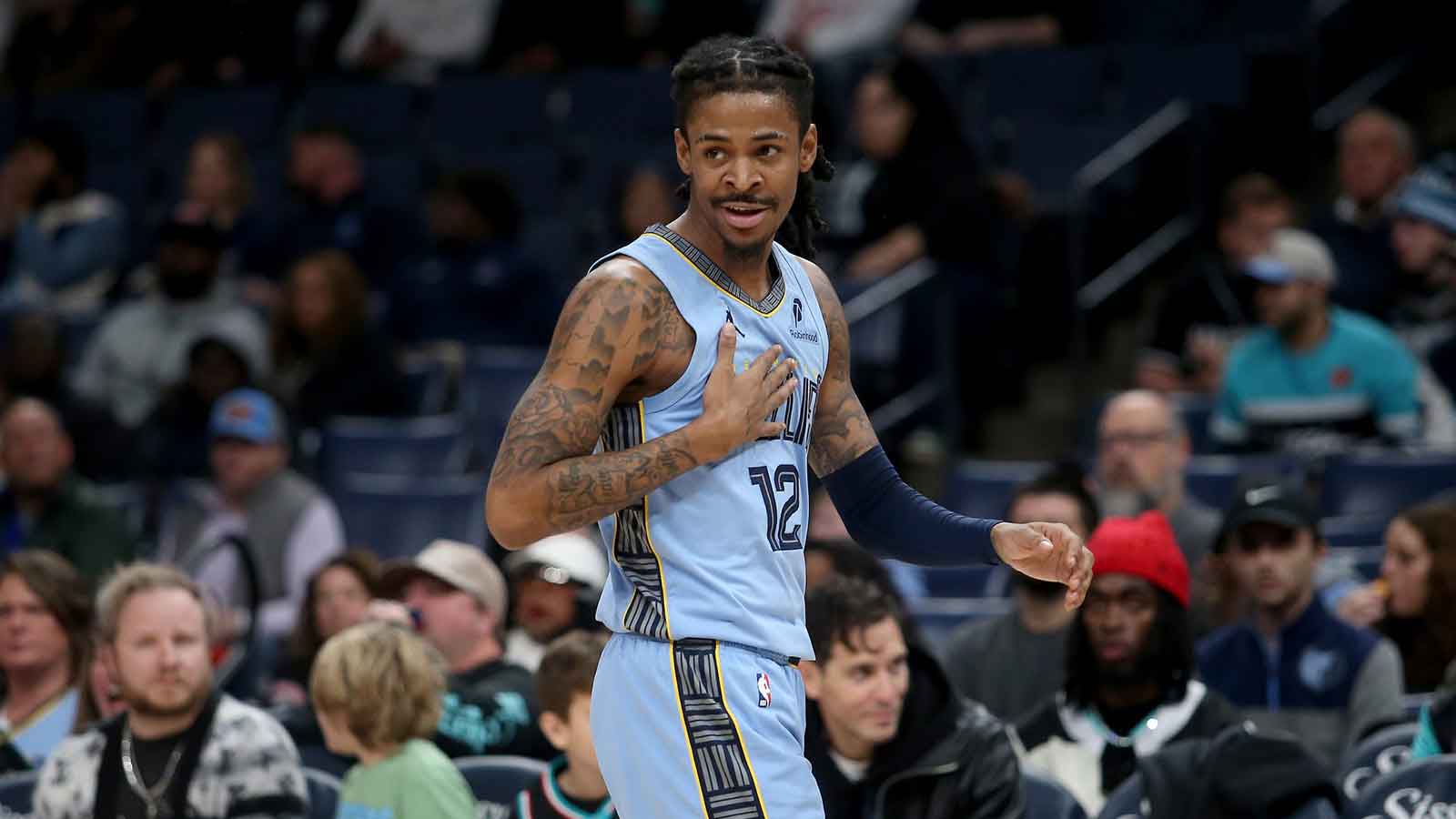 Memphis Grizzlies guard Ja Morant (12) reacts during the first quarter against the Atlanta Hawks at FedExForum.