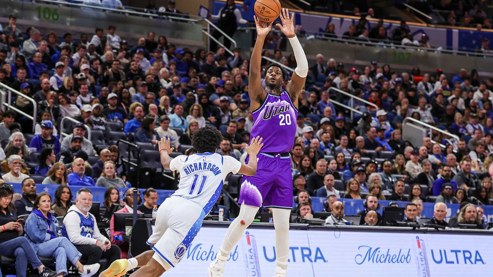 Utah Jazz center Jaren Jackson Jr. (20) shoots a three point basket in front of Orlando Magic guard Jase Richardson (11) during the second half at Kia Center. 