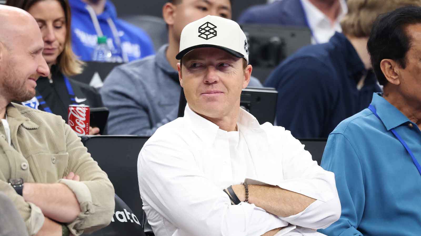  Jazz owner and BYU Cougars alumni Ryan smith watches the game between the BYU Cougars and the Wisconsin Badgers during the second half at Delta Center