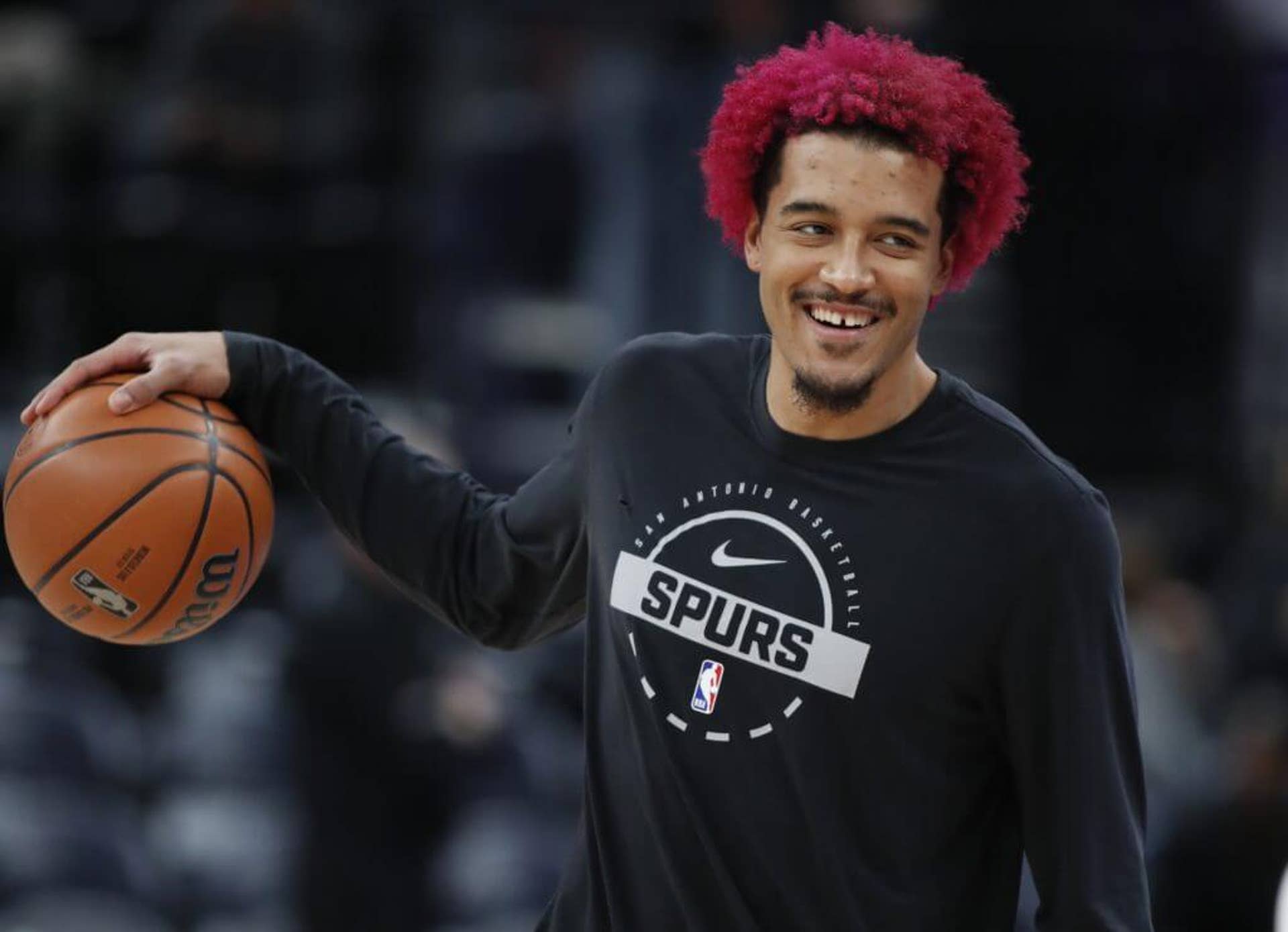 Jeremy Sochan #10 of the San Antonio Spurs warms up before the game against the Utah Jazz at the Delta Center.