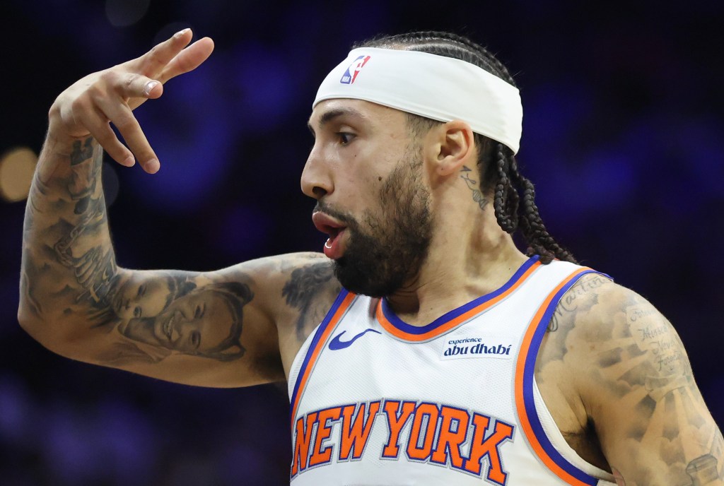 Jose Alvarado celebrates after hitting one of is eight 3-pointers in the Knicks' blowout win over the 76ers in Philadelphia.