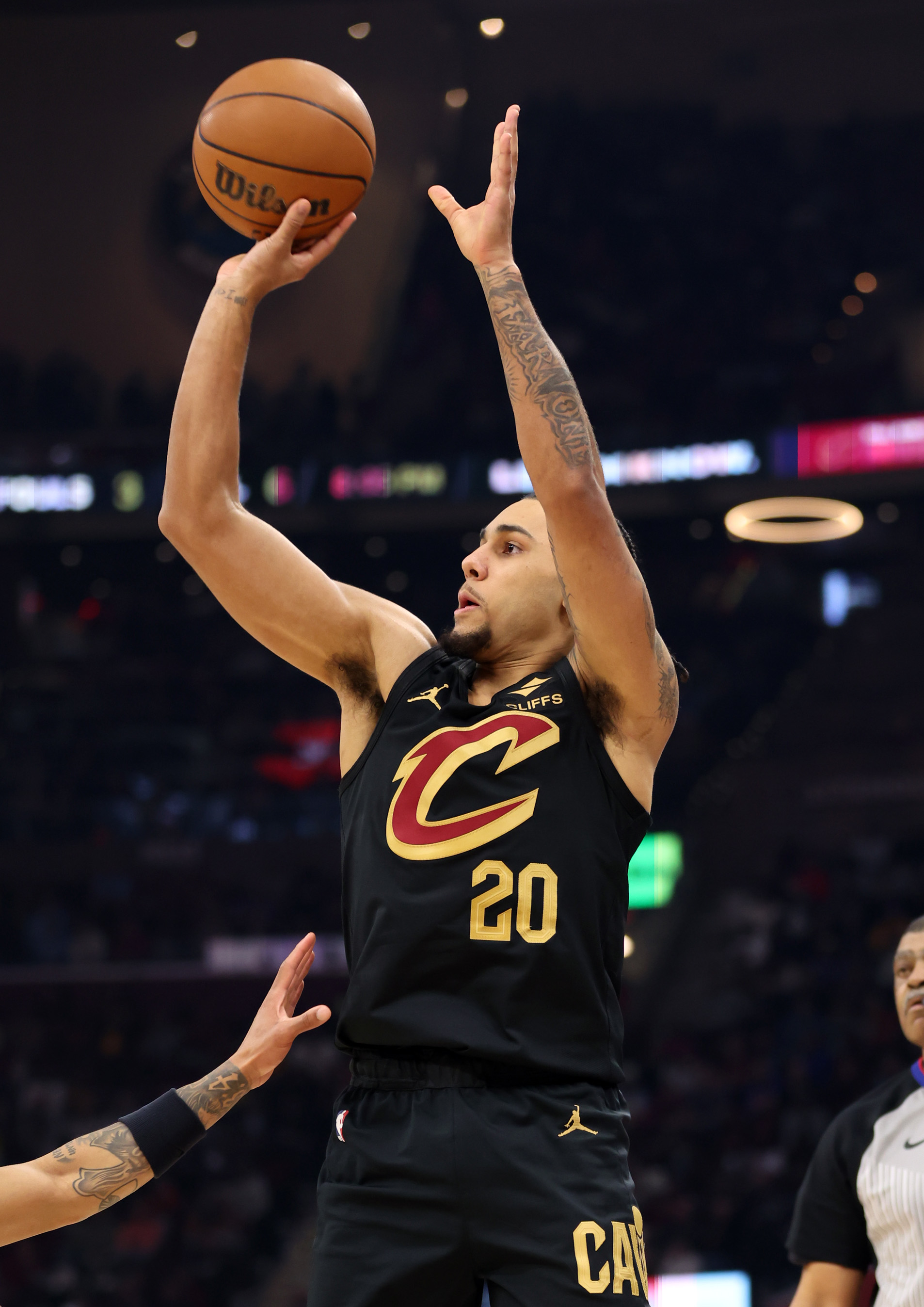 Cleveland Cavaliers guard Jaylon Tyson shoots a three against the Washington Wizards in the first half of play. 