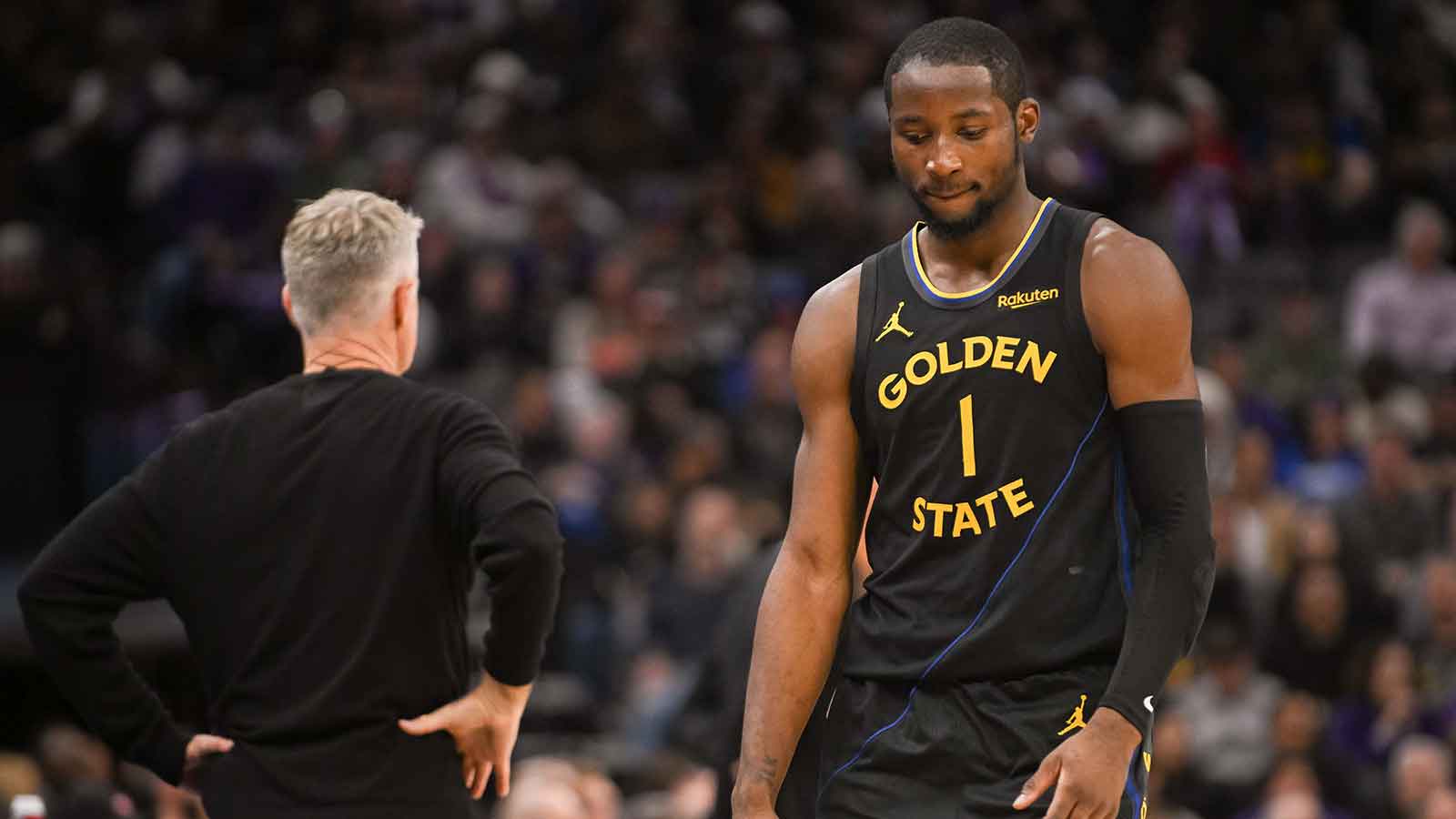 Nov 5, 2025; Sacramento, California, USA; Golden State Warriors forward Jonathan Kuminga (1) walks off the court after being removed from the game during the fourth quarter of the game against the Sacramento Kings at Golden 1 Center. Mandatory Credit: Ed Szczepanski-Imagn Images