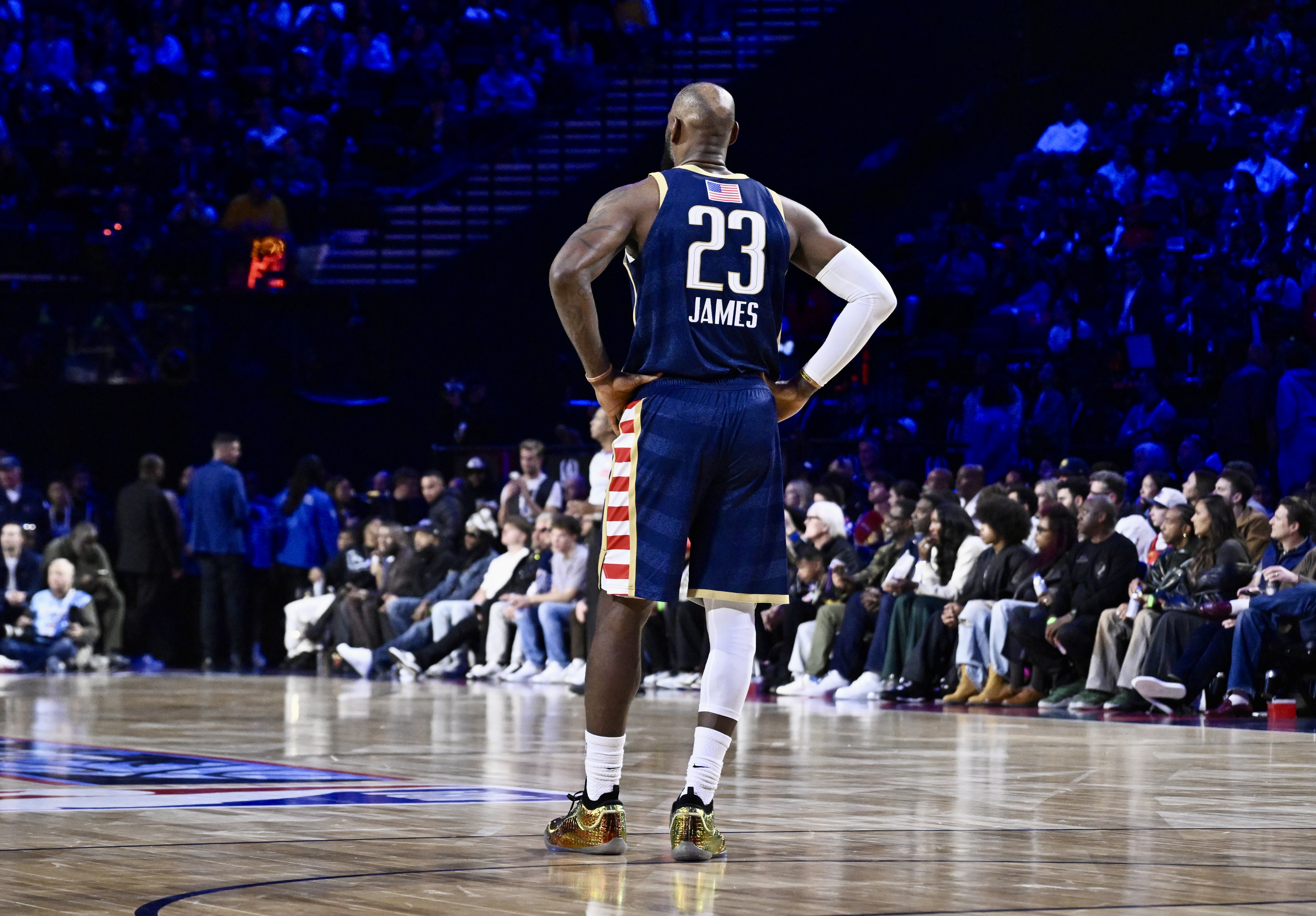 Lakers star LeBron James of Team USA Stripes look on...