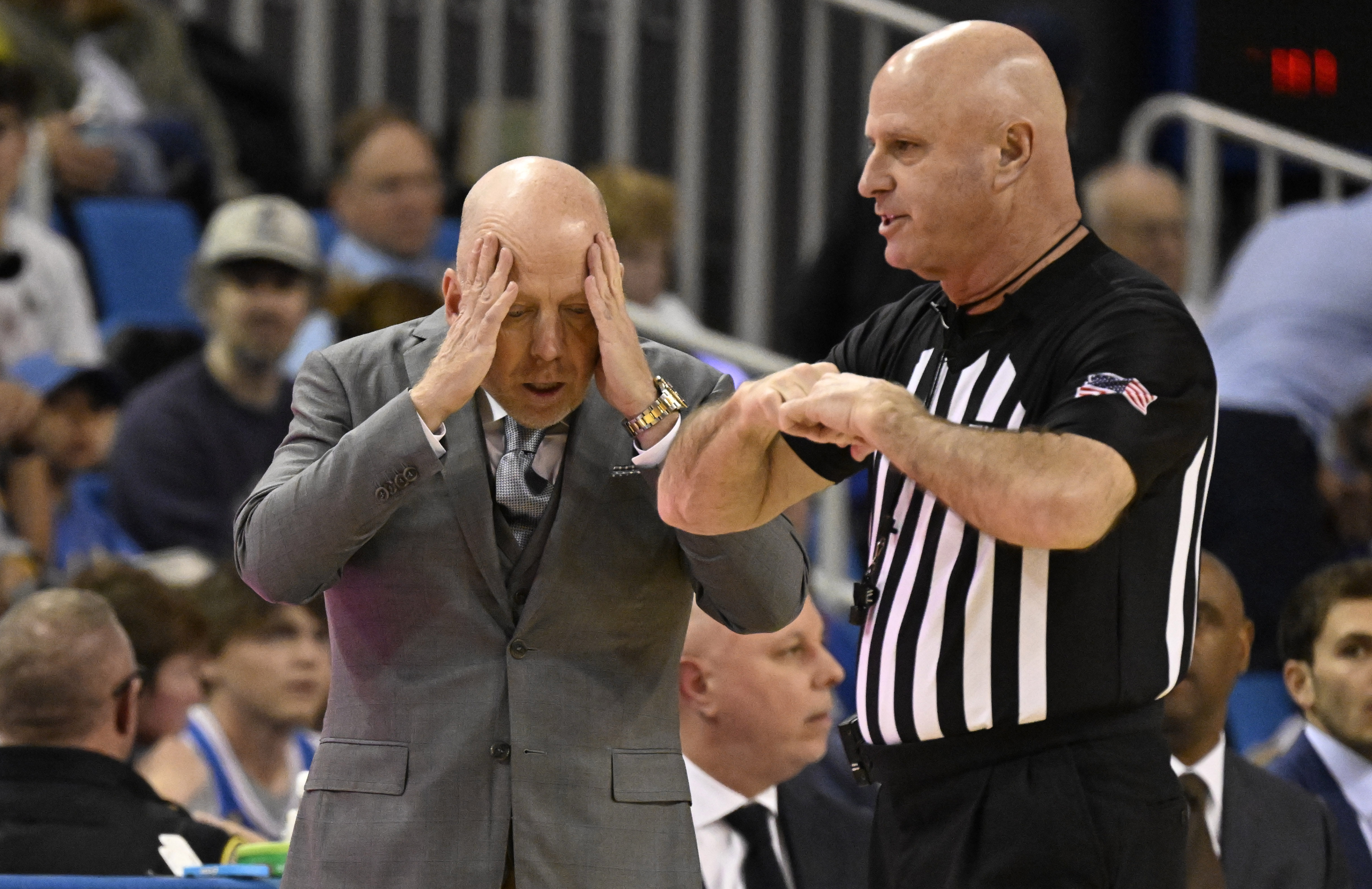 Head coach Mick Cronin of the UCLA Bruins react toward...