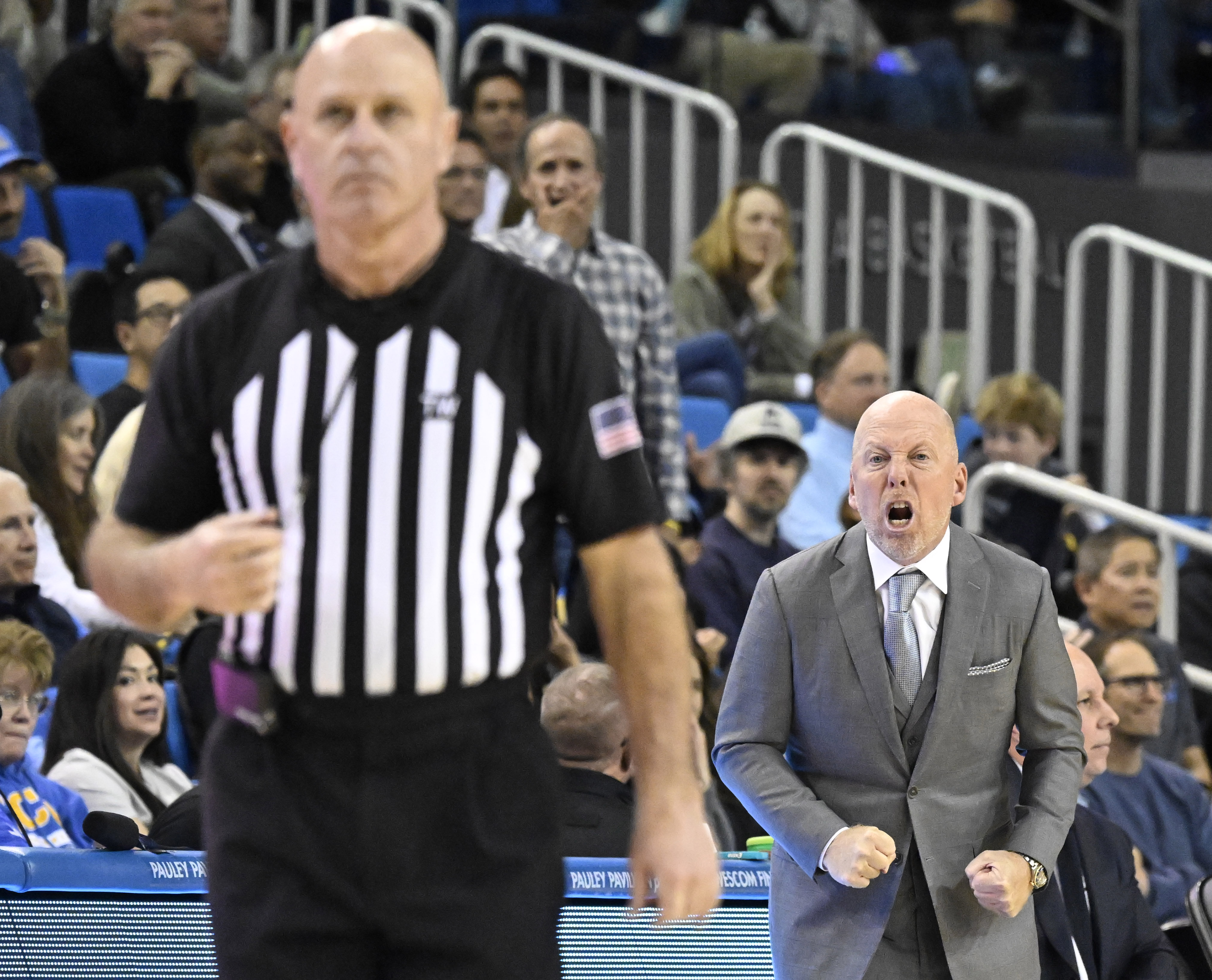 Head coach Mick Cronin of the UCLA Bruins reacts toward...