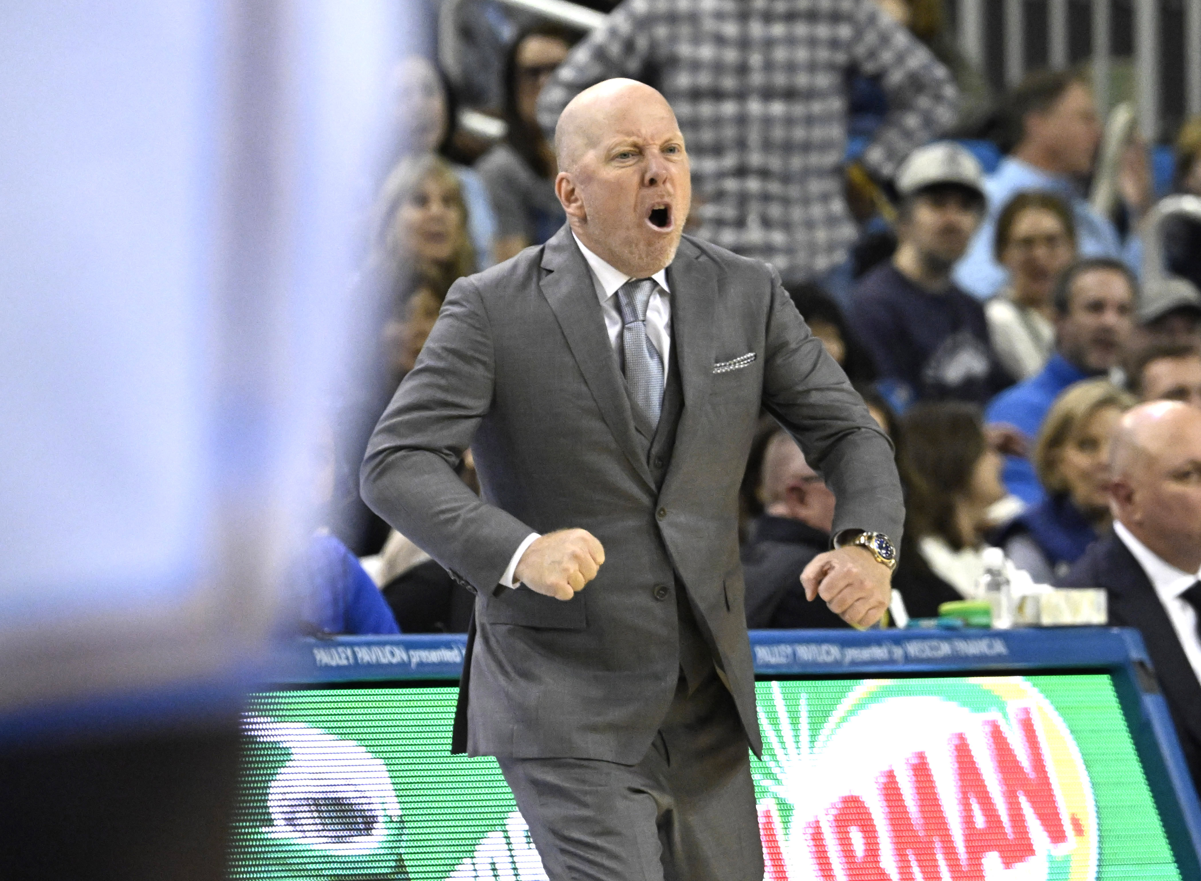 Head coach Mick Cronin of the UCLA Bruins reacts against...