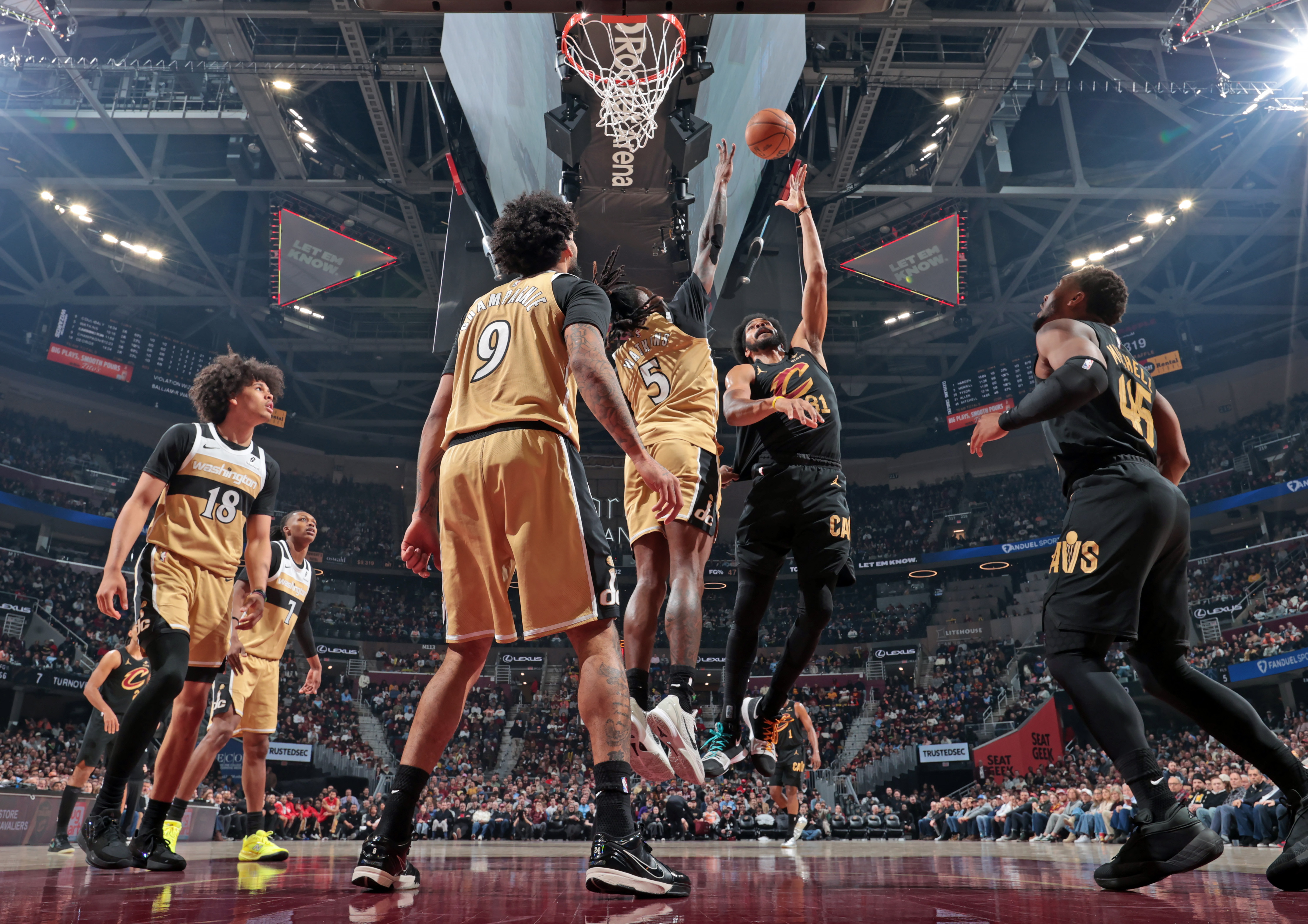 Cleveland Cavaliers center Jarrett Allen puts up two against Washington Wizards guard Jamir Watkins in the second half of play. 