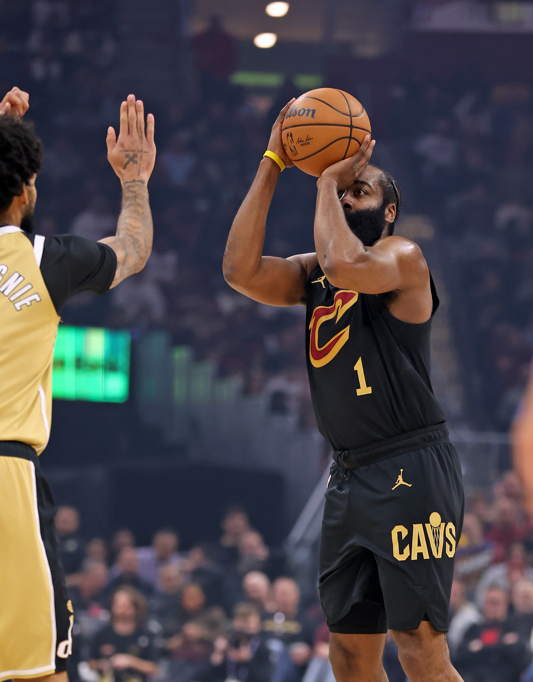Cleveland Cavaliers guard James Harden shoots a three against the Washington Wizards in the first half of play. 